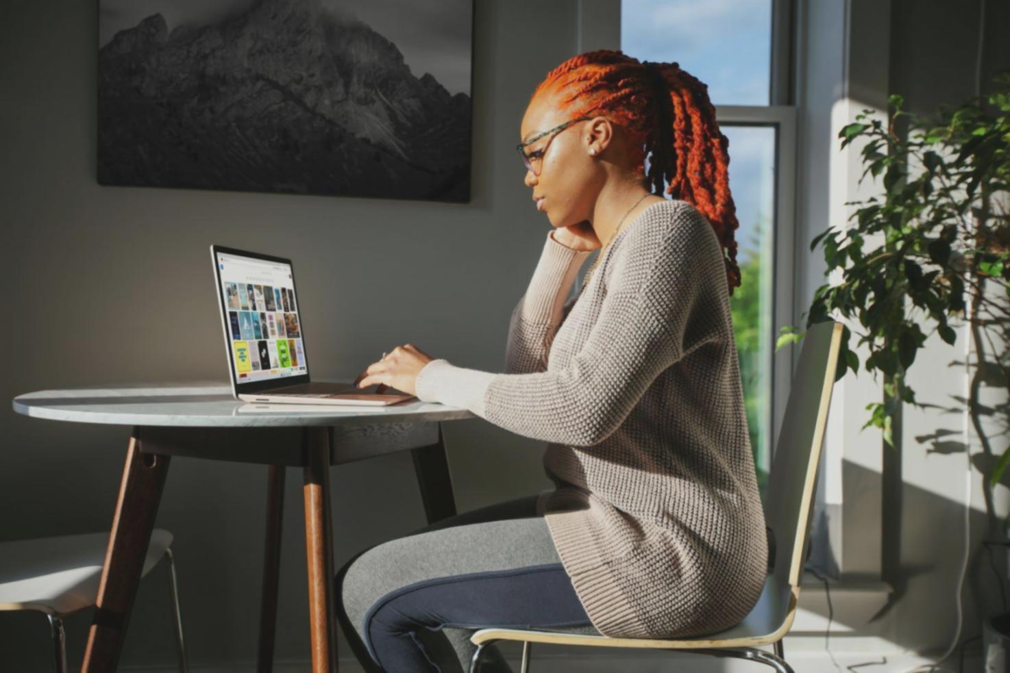 Investment professional analyzing seasonal market data on computer screens